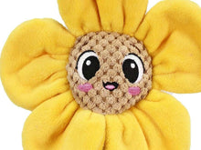 Close-up of talking plush sunflower face with large eyes, yellow petals, and pink cheeks