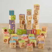 Wooden alphabet and animal-themed blocks with colorful letters and numbered cubes