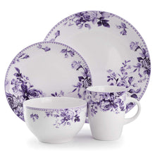 Porcelain dinnerware set with white bowls and plates featuring purple floral rose design