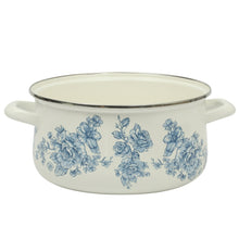 Blue enamel Dutch oven with side handles and blue floral print