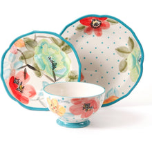 Turquoise-rim floral dinner plates and matching bowl with teal polka dots