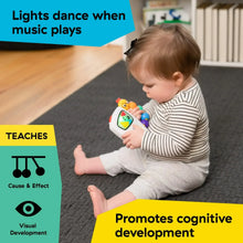 Infant holding musical take-along toy with colorful bead chaser and illuminated screen