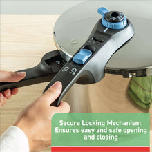 Pressure cooker lid locking handle with blue release button