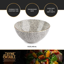 Ceramic soup bowl with black dot speckle pattern and gold rim, 15 oz size shown