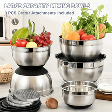 Large stainless steel mixing bowls with black lids and three grater attachments