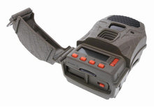 Gray trail camera with top control panel and red buttons on rugged housing