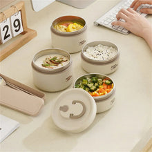 White insulated lunch jars with hinged lids, one lid open, “LUNCH BOX” labels
