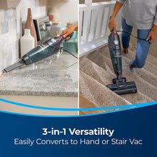 Compact upright vacuum shown for stairs and countertop cleaning with nozzle