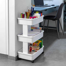 Arctic white 3-tier plastic rolling cart with three open shelves on caster wheels near desk