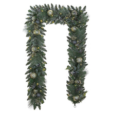 Pre-lit artificial garland with dark green pine branches and metallic baubles, twinkling lights