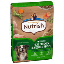 Green dry dog food bag front with dog photo and Real Chicken & Veggies Recipe label