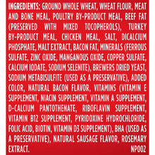 Dog treat ingredients list on package panel, including whole wheat and meat