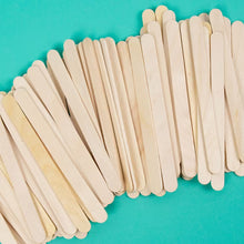 Bundle of pale wood craft sticks with rounded ends