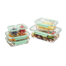 Stacked rectangle food containers with clear lids and mint-green accents, floral patterns