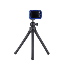 Adjustable mini tripod stand with blue-screen smartphone mounted on ball head
