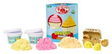 Pretend cupcake baking kit with organic-vanilla mix containers and dough pieces