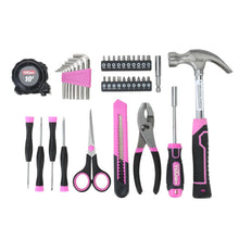 Assorted pink and black household tools layout with wrenches, screwdrivers, and bits