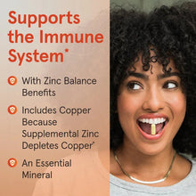 Vegan zinc supplement bottle with orange-and-white label for immune system support
