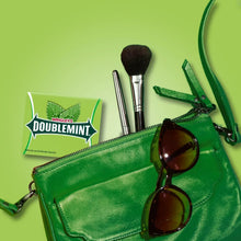 Wrigley’s Doublemint gum wrapper on a green pouch with hanging clip