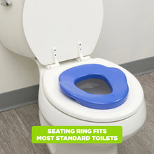 Light blue potty trainer seat ring attached on standard toilet with dark blue top