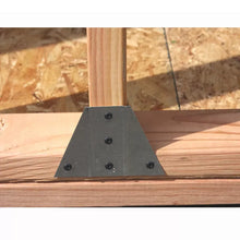 Steel angle support bracket attached to wood framing member
