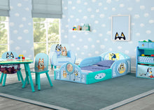 Toddler bed with guardrails, blue and teal frame with character circle window and mattress