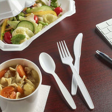 Set of white disposable plastic utensils: fork, knife, and spoon with food bowls