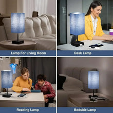 Blue fabric bedside table lamp with black base