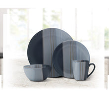 Gray stoneware dinnerware set with plates, bowls, and handled mugs, striped glaze