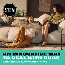 STEM insect killer bug spray with logo near people relaxing on a couch