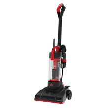 Red upright vacuum from side view with clear dust container and raised handle.