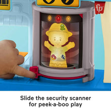 Airport security scanner with glowing character window and sliding front panel toy