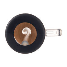 Bamboo lid and black silicone tumbler top with clear straw opening