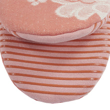Ginger cotton mini oven mitt close-up: white floral cuff above striped band