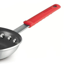 Nonstick frying pan with black interior, silver rim, and red handle with mounting rivets.
