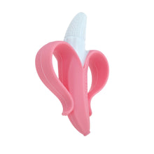 Pink silicone banana infant toothbrush angled with white bristles