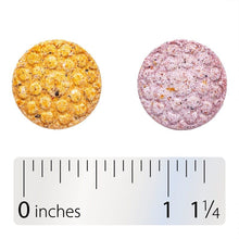Orange and berry chewable tablets with ruler; about 1 1/4 inches long.