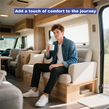 Cordless electric coffee grinder lifestyle scene with person holding a mug