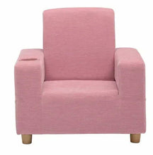 Kids upholstered chair in pink, wide seat, padded arms, tall back, wooden legs.