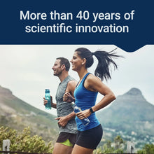 Dietary supplement marketing photo of two runners holding supplement bottles