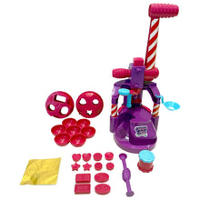 Candy Land Candy Factory toy parts with pink press and small accessory pieces