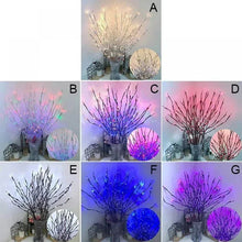 Color-changing lighted branch twigs with LED glow in a vase