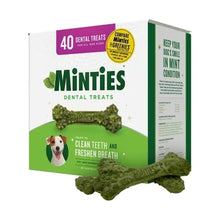 Dental dog treat package with Minties branding and green bone treats shown