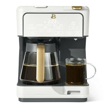 12-cup programmable coffee maker in white, brewing carafe and single-serve cup