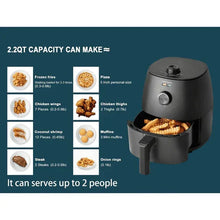 Black 2.2-qt air fryer with basket of fries