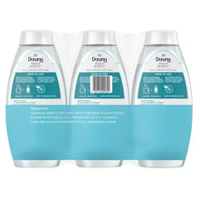 Back view of Downy rinse-and-refresh 3-pack bottles, teal ingredient panel