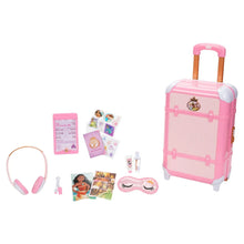 Pink child suitcase playset with pull handle and spread accessory pieces