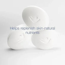 White Dove beauty bar soaps stacked, with oval logos
