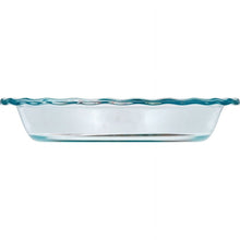 Clear oval glass baking dish with raised rim and side grip handles