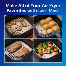 Air fryer parchment liners with assorted foods inside the air fryer basket